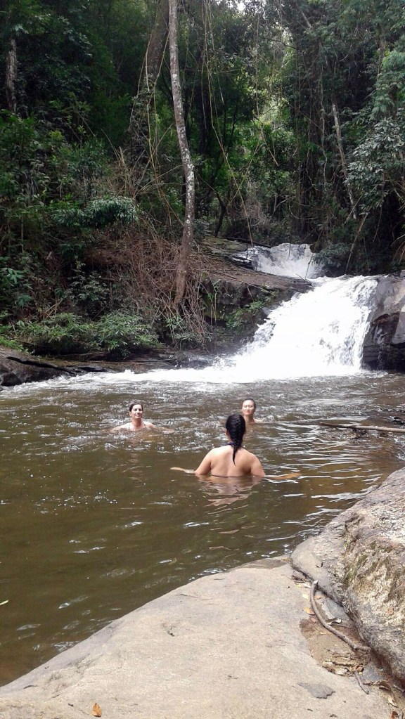 swimming at a waterfalls